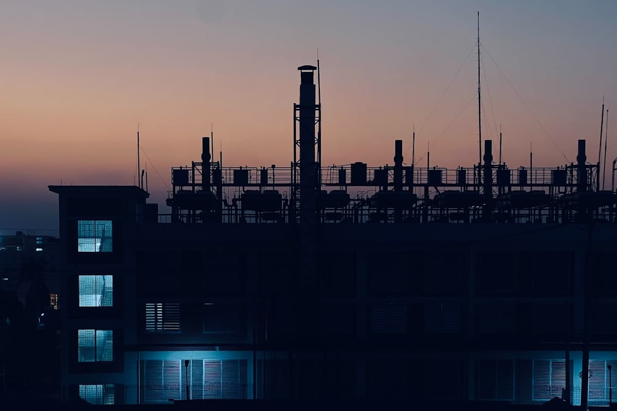 Industrial facility silhouette representing eligible customer power supply