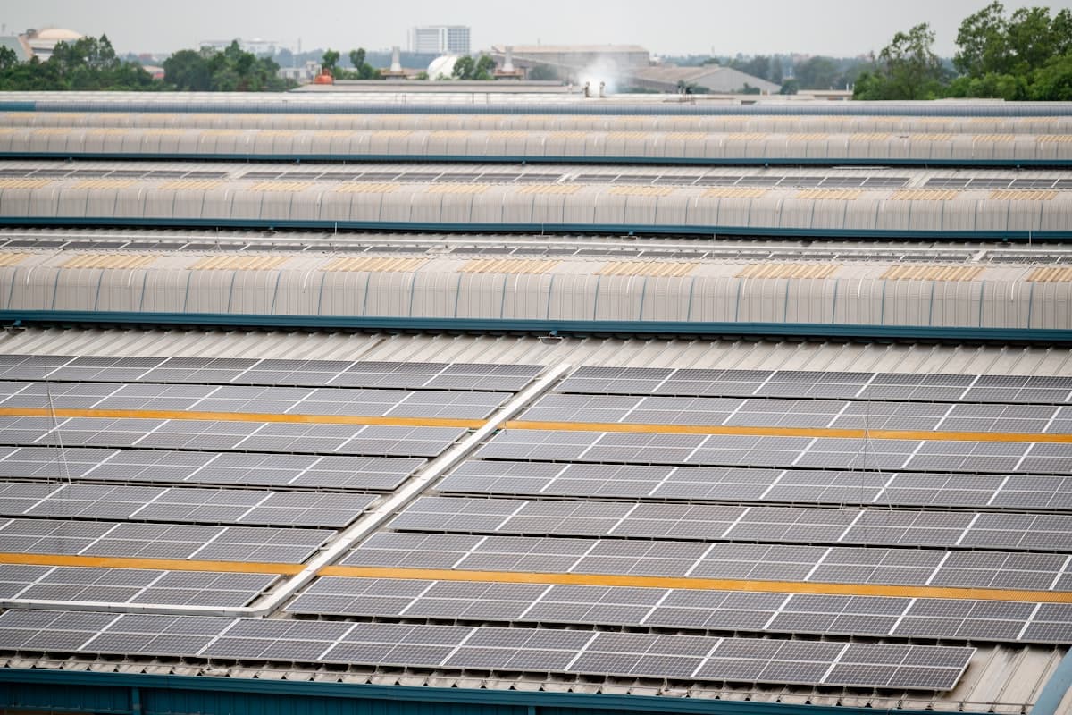 Solar panels on commercial building representing modern energy solutions for Nigerian businesses